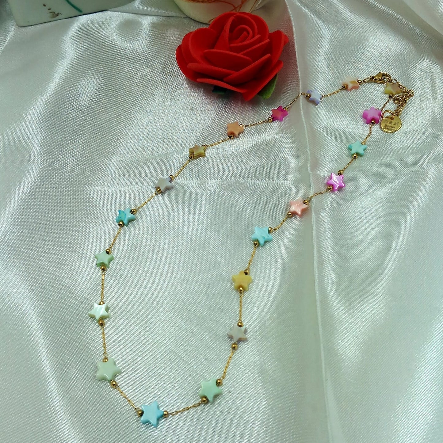 Collana acciaio 316L con stelline madreperla